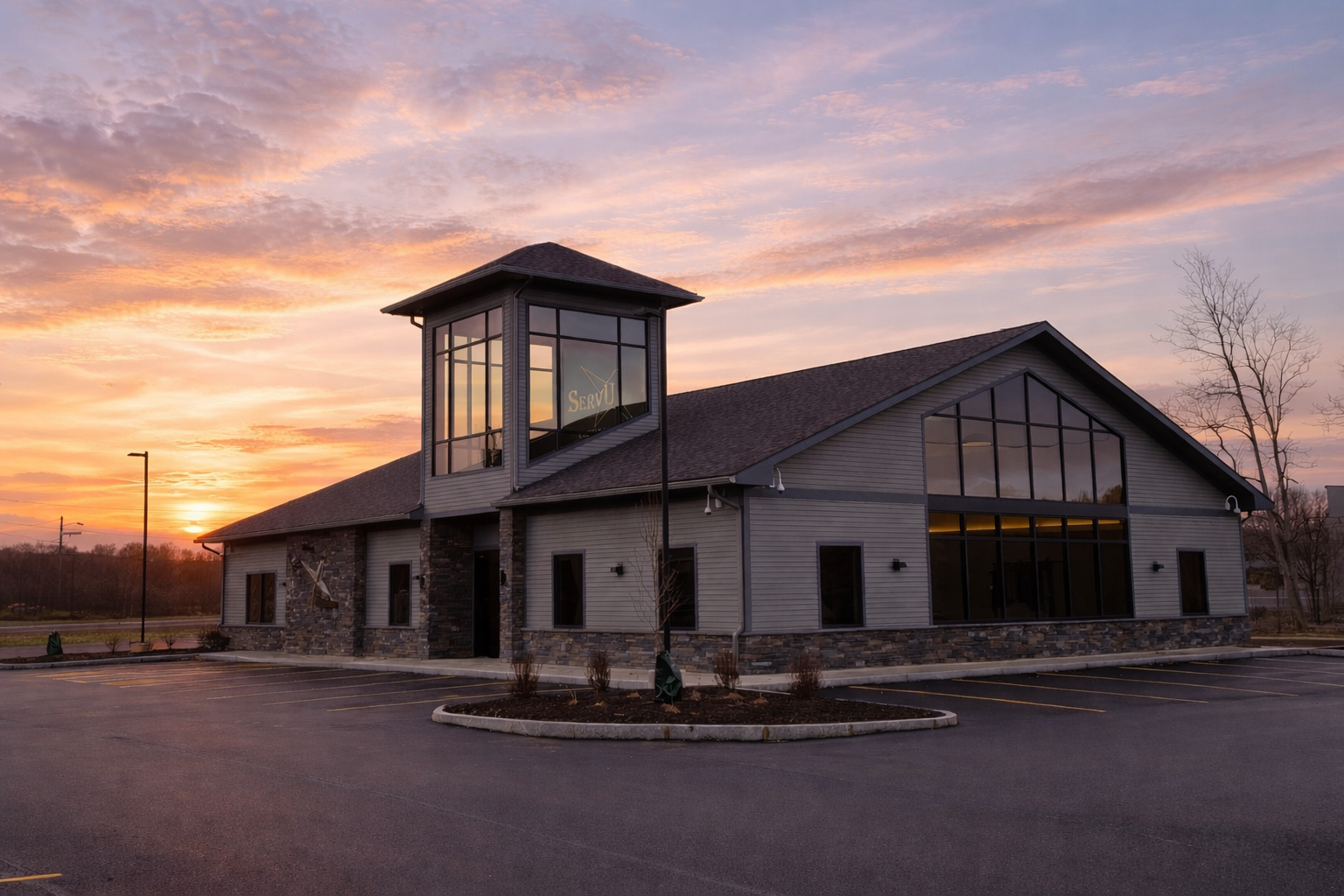 SerVU Credit Union branch at dusk built by Iversen Construction